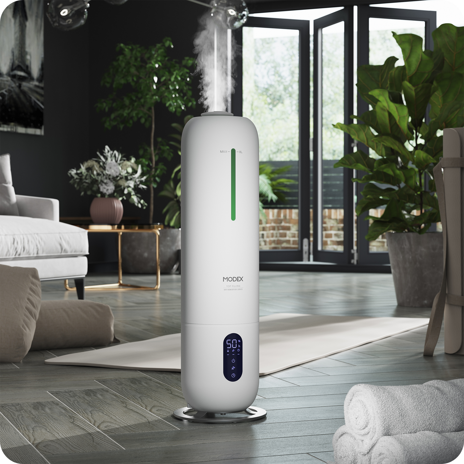 MODEX humidifier releasing mist in a modern living room near plants and rolled towels.