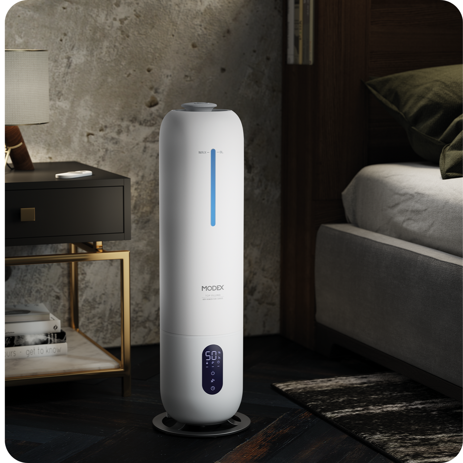MODEX humidifier placed beside a bed in a modern bedroom with a digital humidity display.