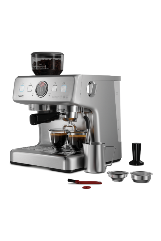 Silver espresso machine with accessories on a white background