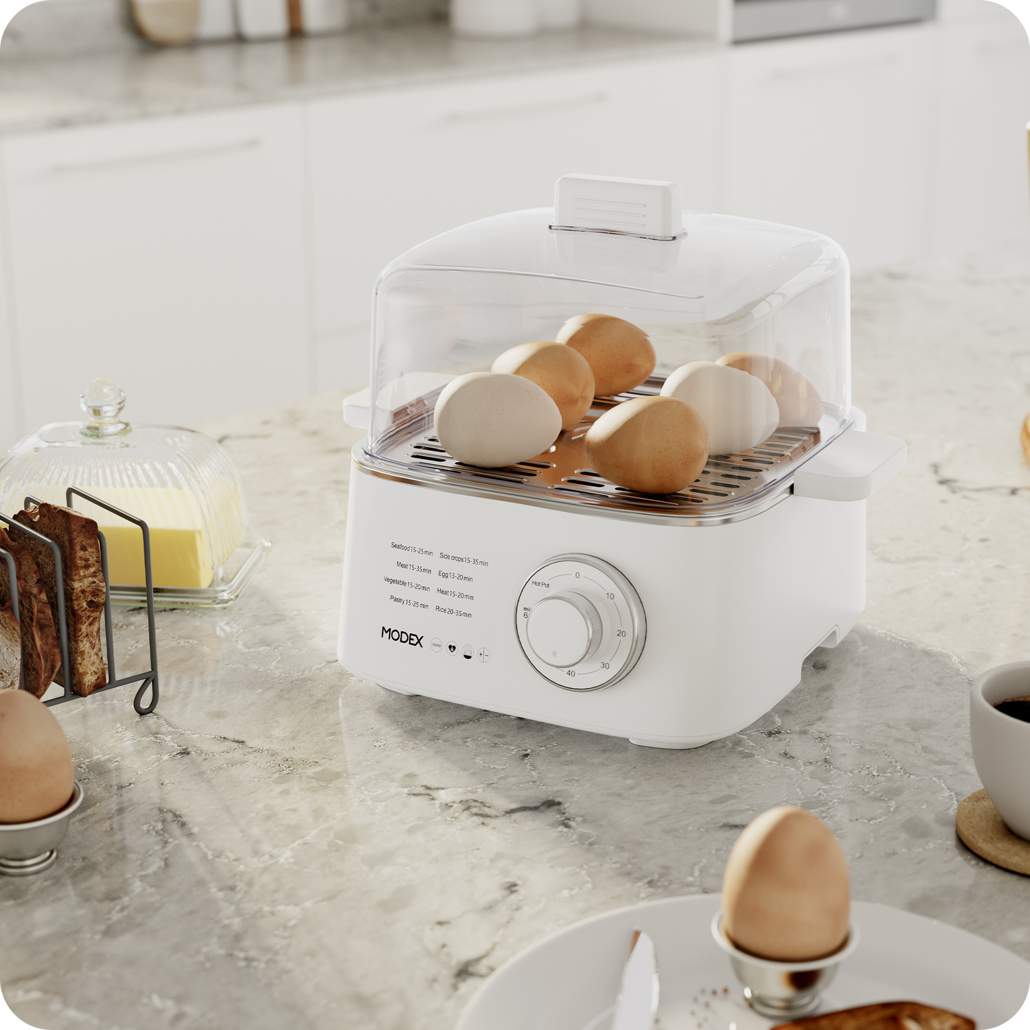 MODEX food steamer being used to steam eggs on a kitchen counter.
