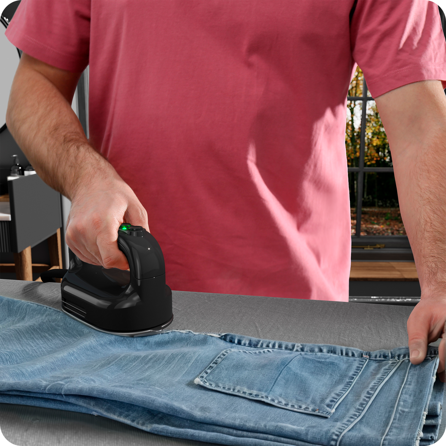 Garment steamer safely steaming a delicate elegant garment with gentle fabric care.