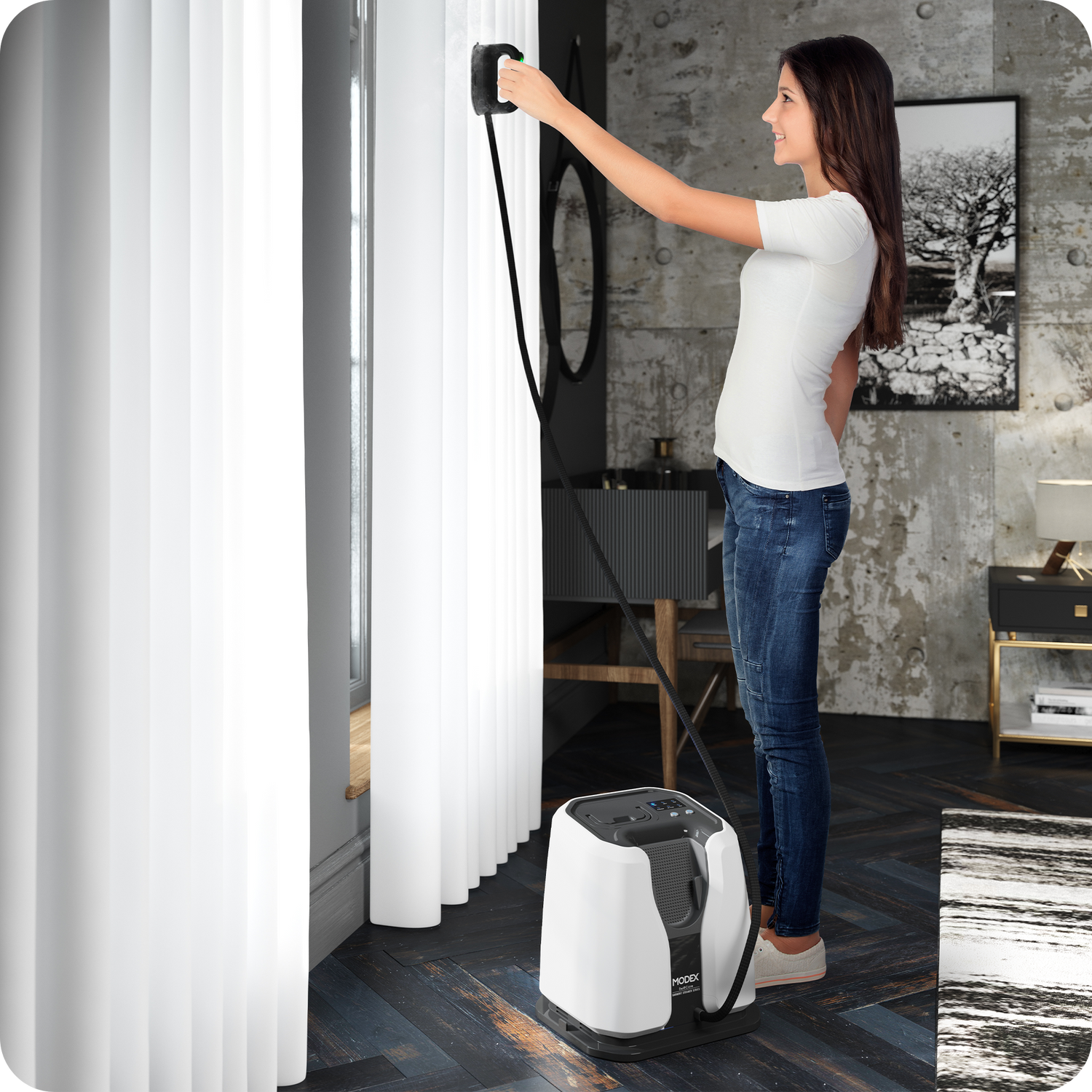 Garment steamer being used on hanging curtains without removing them.
